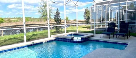 Private pool area, launge chairs and patio furniture