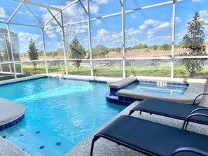 Private pool area, launge chairs and patio furniture