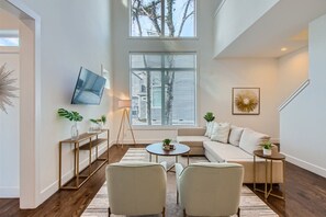 Just inside the homes entry is the inviting living area with lots of natural light