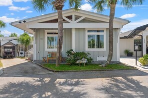 The beautiful Sea Gem Cottage is located in the only cul-de-sac in Venture Out. There is a nice green space with picnic tables across the road hence the "Treasure Island" name.