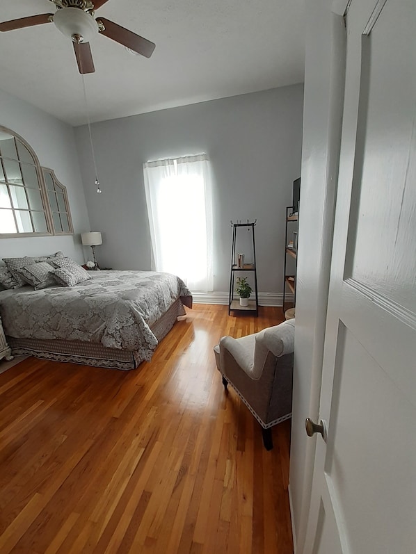 King Heavenly Bed, Two Full Length Windows and Ceiling Fan