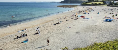 Maenporth beach, a leisurely 20-25 minute walk from Kingfisher Cottage 