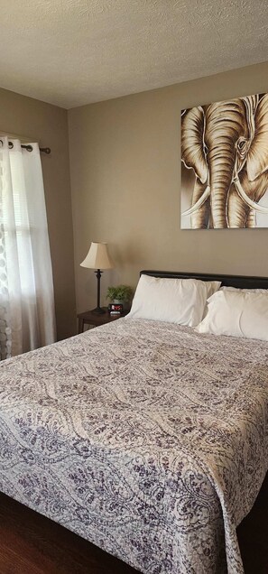 The bedroom with a connected balcony