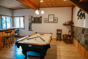 Entertainment room with full size pool table which easily converts to ping pong 
