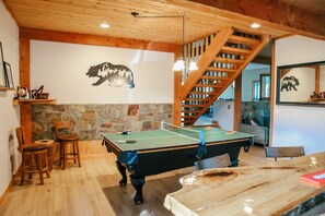 Entertainment room with full size pool table which easily converts to ping pong 