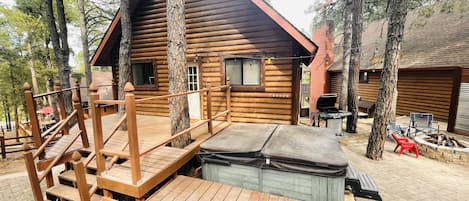 New paver patio with privacy fence between cabins, new paver walkway. 