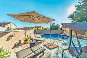 Pool with the sun lounges