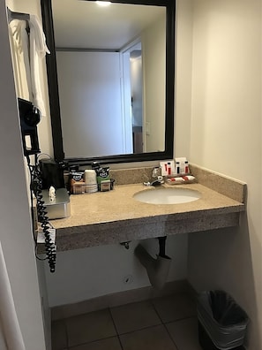 Full bathroom with a shower. Basic toiletries and towels are provided