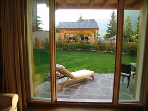 Private Garden with sunlounger and tables and chairs for outside dining