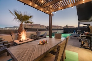 Poolside patio with dining for 6, BBQ, fire pit and pergola