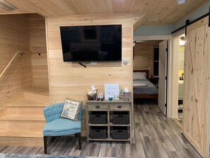 Living Room with Spectrum TV streaming package and WiFi and Welcome guide