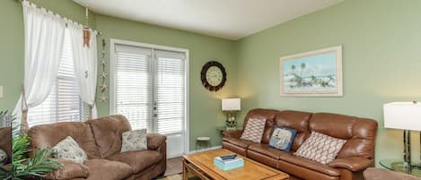 Living area with cozy furnishings and private patio