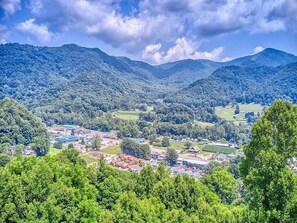 Full view of Maggie Valley from the deck. Multiple mountain ranges.