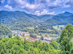 Full view of Maggie Valley from the deck. Multiple mountain ranges.
