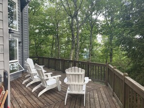 Adirondacks facing south in leafy oasis