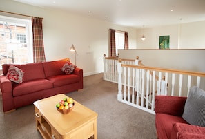First floor: Comfortable sitting area for guests to relax in
