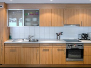 Brown, Countertop, Cabinetry, Kitchen Sink, Sink, Tap, Property, Kitchen Appliance, Kitchen Stove, Kitchen