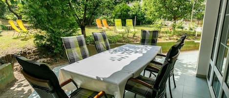 Plant, Table, Furniture, Property, Chair, Nature, Shade, Outdoor Table, Tree, Outdoor Furniture