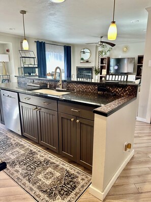 Alternate view of living room from kitchen