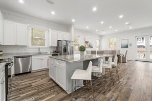 Spacious Kitchen With Large Island Bar On 1st Floor