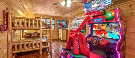 Game room with full size racing game, arcade game, queen bunk beds and 50" HDTV!