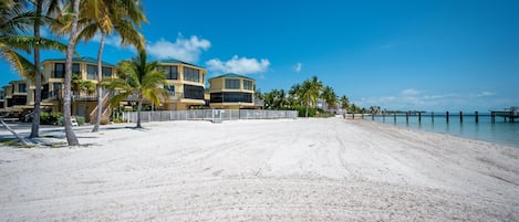 Walk on white sand beach and feel the ocean breeze on your face