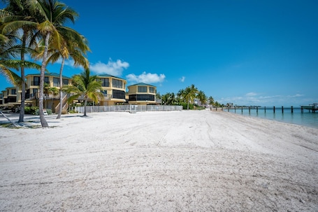 Walk on white sand beach and feel the ocean breeze on your face