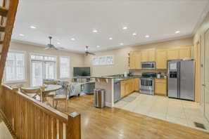 Large kitchen, dining, living room perfect for gathering. 65" 4K TV!