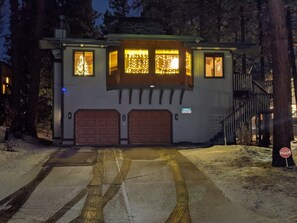 2 story home, well-lit outside on private cul-de-sac with 2 single car garages