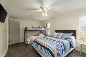 Queen bed and 3 twin beds