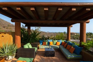 Lounge area pergola seating on private rooftop deck-2nd floor of the penthouse.