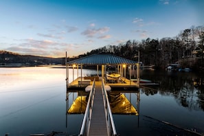 Your own personal boat dock with SUPs and kayaks awaits. Boat rentals available!
