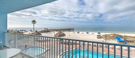 Large balcony overlooking the pool, beach and Gulf of Mexico