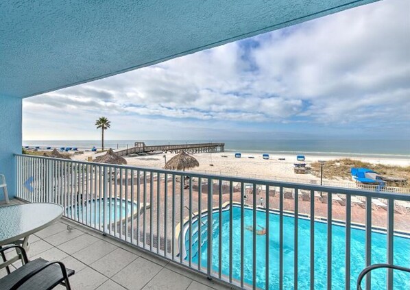 Large balcony overlooking the pool, beach and Gulf of Mexico