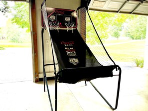 Let the Kentucky Basketball challenges begin with this pop-a-shot in the garage!