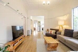 Living area through to Kitchen 