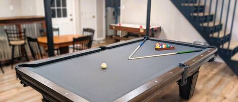 Finished game room was made for fun! Full size billiards table is perfect for some friendly competition!