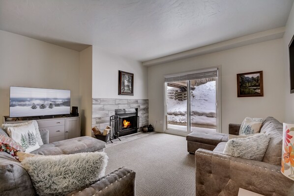 Wood burning fireplace in living area