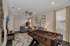 Guests will love the ultimate entertainment hub—perfect for kids, teens, and adults to unwind after a day at the parks.