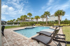 Direct access from the living area to the patio and pool makes indoor-outdoor living seamless and enjoyable.