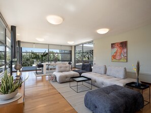 Plenty of natural light enters the living room area