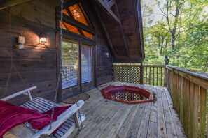 View of the rear entry door and hot tub