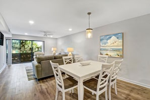 Dining Room - Nice open floor plan. All new furniture in this large dining area that comfortably seats 6.