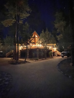 Happy Pine Cabin at night