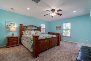 King bed and futon couch- Primary bedroom upstairs