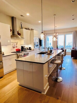Open floor plan, kitchen and dining room