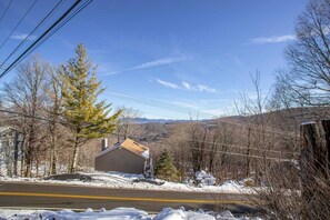 Look out at Mountain Views from rear deck at Holiday Hideaway