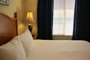 Second floor bedroom with a King size bed and the TV