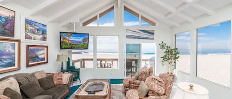 Showcasing uninterrupted views of Newport's white sand beaches and sparkling Pacific Ocean, this upper unit is perfect for families  looking to enjoy the beach on a budget.