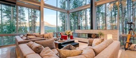 Seventh Heaven's soaring 20' living room windows deliver endless mountain views